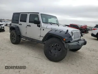 2009 Jeep Wrangler Unlimited Rubicon with VIN 1J8GA69169L731787, listed as a Copart auction lot 44604125 with 180,861 mi miles and Salvage title. Bid and sale history available at DreamBid. Image 4.