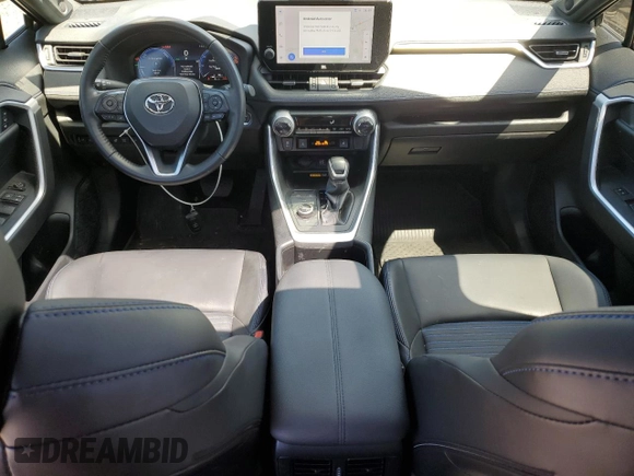 2024 Toyota RAV4 Hybrid XSE with VIN JTME6RFV2RJ047582, listed as a Copart auction lot 63658395 with 26,345 mi miles and Salvage title. Bid and sale history available at DreamBid. Image 8.