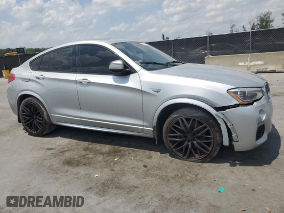 2018 BMW X4 M40i z VIN 5UXXW7C55J0W63724, wystawiony jako Copart lot #55757755 z przebiegiem 149 480 mil mil oraz Tytuł czysty. Historia ofert i sprzedaży dostępna na DreamBid. Obrazek 4.