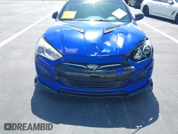 2013 Hyundai Genesis Coupe 2.0T z VIN KMHHT6KD1DU090198, wystawiony jako IAAI lot #42297169 z przebiegiem 69 501 mil mil oraz . Historia ofert i sprzedaży dostępna na DreamBid. Obrazek 6.