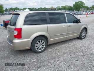 2013 Chrysler Town & Country Touring with VIN 2C4RC1BG6DR631586, listed as a IAAI auction lot 42113388 with 222,706 mi miles and . Bid and sale history available at DreamBid. Image 4.