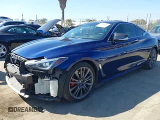 2017 Infiniti Q60 Red Sport 400 with VIN JN1FV7EK3HM610741, listed as a IAAI auction lot 41856207 with 67,598 mi miles and . Bid and sale history available at carsss.com. Image 2.