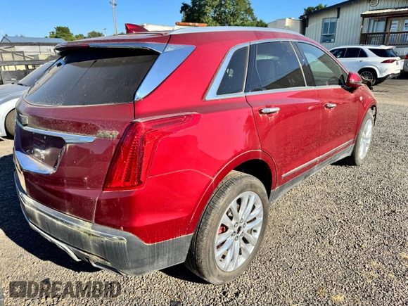 2019 Cadillac XT5 Premium Luxury AWD with VIN 1GYKNFRS2KZ251595, listed as a Copart auction lot 65834135 with 23,925 mi miles and Salvage title. Bid and sale history available at DreamBid. Image 4.