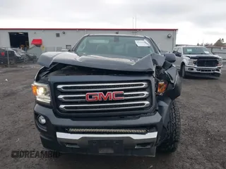 2016 GMC Canyon 4WD SLE with VIN 1GTG6CE37G1282630, listed as a IAAI auction lot 41153472 with 57,809 mi miles. Bid and sale history available at carsss.com. Image 12.