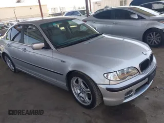 2002 BMW 3 Series 330i with VIN WBAEV53402KM21739, listed as a IAAI auction lot 42170772 with 185,571 mi miles and . Bid and sale history available at DreamBid. Image 1.