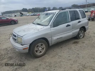 2004 Chevrolet Tracker LT z VIN 2CNBE634746907607, wystawiony jako Copart lot #77958934 z przebiegiem Nie podano mil oraz Czysty tytuł • Clean title. Historia ofert i sprzedaży dostępna na DreamBid. Obrazek 1.