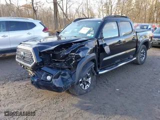 2019 Toyota Tacoma 4WD SR with VIN 3TMCZ5AN0KM261364, listed as a IAAI auction lot 41845950 with 85,230 mi miles. Bid and sale history available at carsss.com. Image 2.