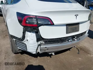 2020 Tesla Model 3 Standard Range Plus with VIN 5YJ3E1EA4LF644967, listed as a IAAI auction lot 41745984 with 23,479 mi miles and . Bid and sale history available at DreamBid. Image 21.