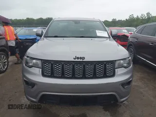 2018 Jeep Grand Cherokee Laredo E with VIN 1C4RJFAG6JC452859, listed as a IAAI auction lot 42647127 with 107,869 mi miles and . Bid and sale history available at DreamBid. Image 11.