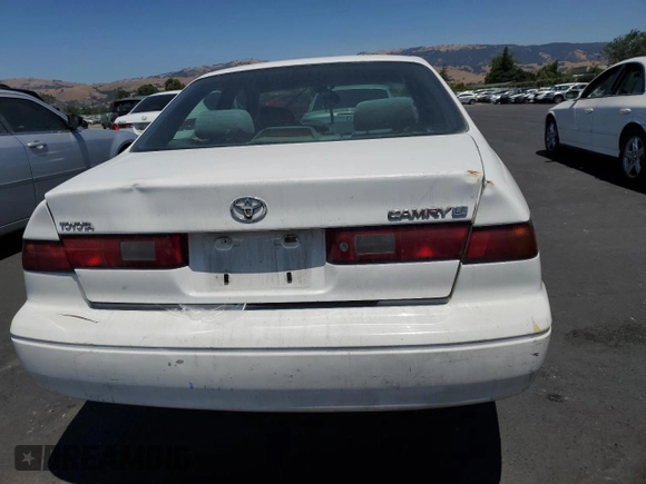 1997 Toyota Camry LE with VIN JT2BG22K7V0005405, listed as a Copart auction lot 58988545 with 268,952 mi miles and Salvage title. Bid and sale history available at DreamBid. Image 6.