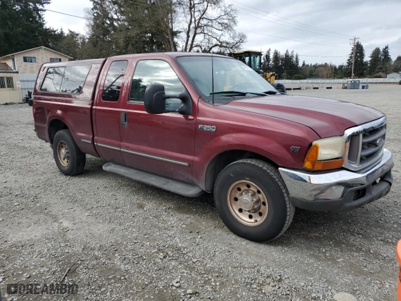 1999 Ford Super Duty F-250 XL with VIN 1FTNX20L1XEC32594, listed as a Copart auction lot 49801605 with 239,103 mi miles and Salvage Title. Bid and sale history available at carsss.com. Image 4.