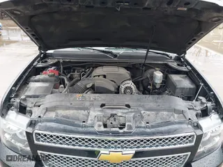 2013 Chevrolet Suburban LT with VIN 1GNSKJE71DR308480, listed as a IAAI auction lot 41695090 with 129,000 mi miles. Bid and sale history available at carsss.com. Image 10.