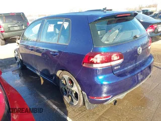 2011 Volkswagen GTI w/Sunroof & Navi PZEV z VIN WVWGD7AJ7BW273794, wystawiony jako IAAI lot #41603135 z przebiegiem 102 535 mil mil oraz . Historia ofert i sprzedaży dostępna na DreamBid. Obrazek 3.
