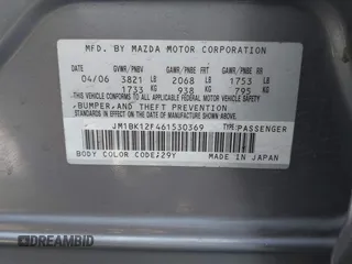 2006 Mazda 3 i with VIN JM1BK12F461530369, listed as a IAAI auction lot 41990008 with 169,878 mi miles. Bid and sale history available at carsss.com. Image 9.