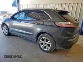 2019 Ford Edge SEL z VIN 2FMPK3J96KBC72783, wystawiony jako Copart lot #57761175 z przebiegiem 153 590 mil mil oraz Czysty tytuł • Clean title. Historia ofert i sprzedaży dostępna na DreamBid. Obrazek 2.
