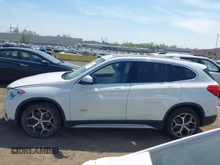 2018 BMW X1 xDrive28i with VIN WBXHT3C39J5F91912, listed as a IAAI auction lot 42099647 with 79,023 mi miles and . Bid and sale history available at DreamBid. Image 14.