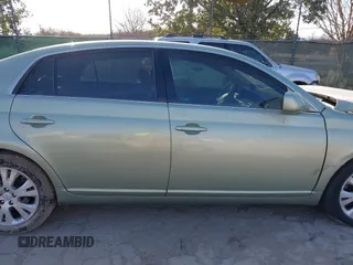 2010 Toyota Avalon XL with VIN 4T1BK3DB9AU354427, listed as a IAAI auction lot 41614018 with Not Provided miles and . Bid and sale history available at carsss.com. Image 13.