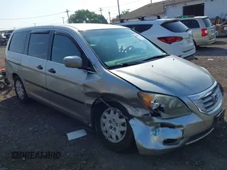 2009 Honda Odyssey LX with VIN 5FNRL382X9B049310, listed as a IAAI auction lot 42742039 with 166,536 mi miles and . Bid and sale history available at DreamBid. Image 1.
