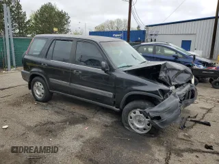 1998 Honda CR-V LX z VIN JHLRD184XWC103414, wystawiony jako Copart lot #54770395 z przebiegiem 233 166 mil mil oraz Szkoda całkowita • Salvage title. Historia ofert i sprzedaży dostępna na DreamBid. Obrazek 4.