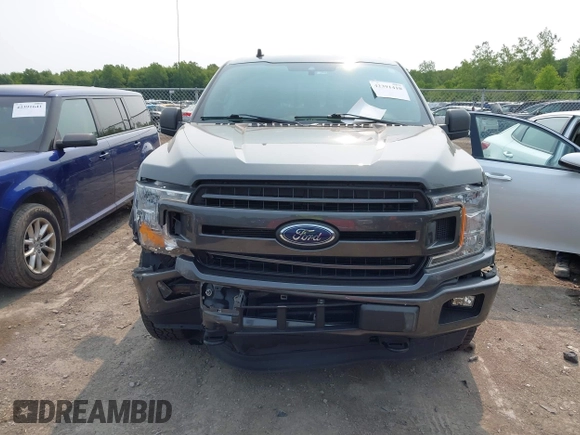 2020 Ford F-150 XL with VIN 1FTEW1EP1LFC21317, listed as a IAAI auction lot 42391410 with 77,999 mi miles and . Bid and sale history available at DreamBid. Image 12.