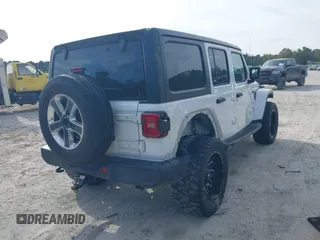 2018 Jeep Wrangler Unlimited Sahara z VIN 1C4HJXEG4JW220092, wystawiony jako IAAI lot #40522478 z przebiegiem 90 529 mil mil oraz . Historia ofert i sprzedaży dostępna na DreamBid. Obrazek 4.