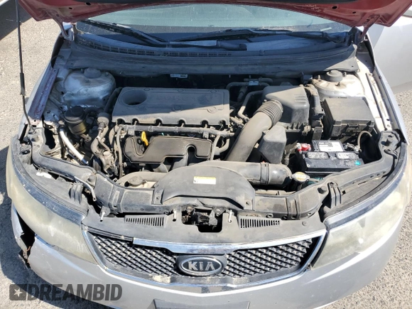 2010 Kia Forte EX z VIN KNAFU4A24A5054277, wystawiony jako Copart lot #56007995 z przebiegiem 218 782 mil mil oraz Szkody całkowita. Historia ofert i sprzedaży dostępna na DreamBid. Obrazek 11.