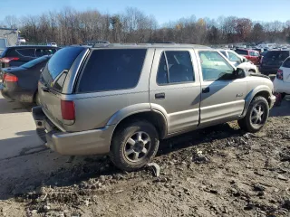 2000 Oldsmobile Bravada z VIN 1GHDT13WXY2255649, wystawiony jako Copart lot #80021214 z przebiegiem Nie podano mil oraz Szkody całkowita. Historia ofert i sprzedaży dostępna na DreamBid. Obrazek 3.