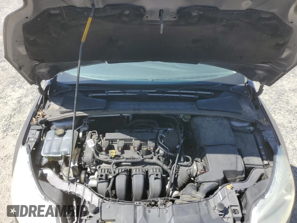 2014 Ford Focus SE z VIN 1FADP3K2XEL457861, wystawiony jako Copart lot #59381205 z przebiegiem 110 430 mil mil oraz Szkoda całkowita • Salvage title. Historia ofert i sprzedaży dostępna na DreamBid. Obrazek 11.