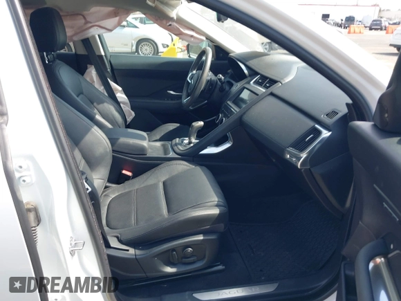 2019 Jaguar E-Pace SE with VIN SADFP2FX8K1Z70007, listed as a IAAI auction lot 42120274 with 32,487 mi miles and . Bid and sale history available at DreamBid. Image 5.
