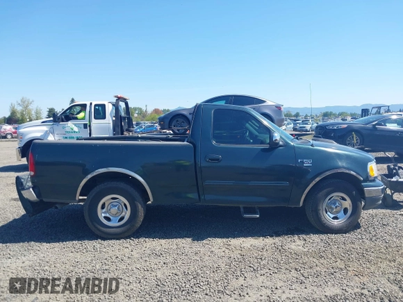 2002 Ford F-150 XL with VIN 1FTRF17W52KE24870, listed as a IAAI auction lot 42024831 with 319,578 mi miles and . Bid and sale history available at DreamBid. Image 13.