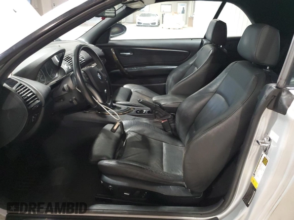 2008 BMW 1 Series 128i with VIN WBAUL73578VE89293, listed as a Copart auction lot 61902535 with 168,652 mi miles and Salvage title. Bid and sale history available at DreamBid. Image 7.