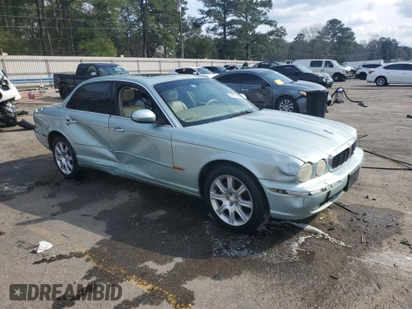 2004 Jaguar XJ with VIN SAJWA71C94SG24466, listed as a Copart auction lot 46610995 with 173,570 mi miles and Salvage Title. Bid and sale history available at carsss.com. Image 4.