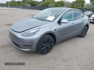 2025 Tesla Model Y Long Range with VIN 7SAYGDED5SF257258, listed as a IAAI auction lot 41877196 with 4,442 mi miles and . Bid and sale history available at DreamBid. Image 17.