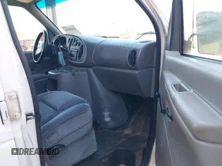 1999 Ford Econoline Cargo with VIN 1FTRE1429XHC29847, listed as a IAAI auction lot 41680406 with 262,002 mi miles. Bid and sale history available at carsss.com. Image 5.