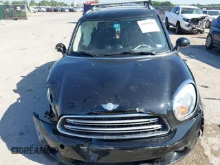 2015 MINI Countryman with VIN WMWZB3C54FWM33074, listed as a IAAI auction lot 42094992 with 86,704 mi miles and . Bid and sale history available at DreamBid. Image 13.