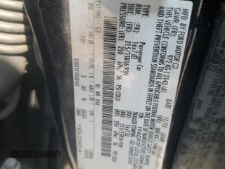 2016 Ford Focus SE with VIN 1FADP3F22GL233402, listed as a Copart auction lot 60854175 with 77,002 mi miles and Salvage title. Bid and sale history available at DreamBid. Image 13.