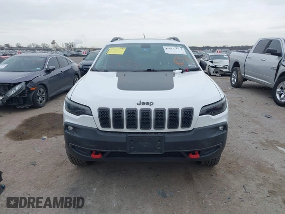 2019 Jeep Cherokee Trailhawk with VIN 1C4PJMBN6KD124023, listed as a IAAI auction lot 41432217 with 76,934 mi miles and . Bid and sale history available at DreamBid. Image 13.