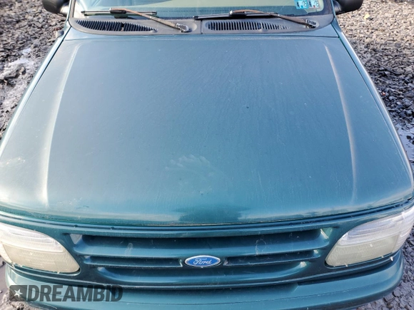 1997 Ford Explorer XL z VIN 1FMDU34E2VZA14008, wystawiony jako Copart lot #43590605 z przebiegiem 185 995 mil mil oraz Szkoda całkowita • Salvage title. Historia ofert i sprzedaży dostępna na DreamBid. Obrazek 12.