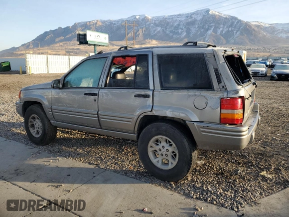 1998 Jeep Grand Cherokee Limited с VIN 1J4GZ78Y0WC260231, выставлен на аукционе Copart как лот 85149724 с пробегом 203 258 миль миль и Списание • Salvage title. История ставок и продаж доступна на DreamBid. Изображение 2.