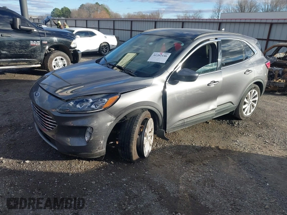 2021 Ford Escape Titanium Hybrid z VIN 1FMCU0DZ0MUB00944, wystawiony jako IAAI lot #41202146 z przebiegiem 52 458 mil mil oraz . Historia ofert i sprzedaży dostępna na DreamBid. Obrazek 17.