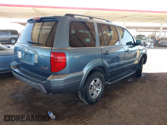 2005 Honda Pilot EX with VIN 2HKYF184X5H539427, listed as a IAAI auction lot 42004991 with 173,623 mi miles. Bid and sale history available at carsss.com. Image 4.
