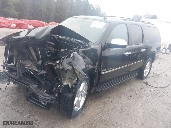 2012 Chevrolet Suburban LTZ with VIN 1GNSKKE74CR221161, listed as a IAAI auction lot 41543212 with 307,235 mi miles. Bid and sale history available at carsss.com. Image 2.