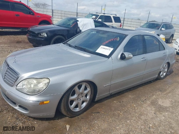 2005 Mercedes-Benz S-Class 5.0L with VIN WDBNG84J55A458443, listed as a IAAI auction lot 41804975 with 180,101 mi miles. Bid and sale history available at carsss.com. Image 2.