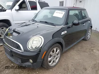 2010 MINI Hardtop S with VIN WMWMF7C52ATZ69084, listed as a IAAI auction lot 42576294 with Not provided miles and . Bid and sale history available at DreamBid. Image 2.