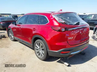 2021 Mazda CX-9 Signature with VIN JM3TCBEY9M0500122, listed as a IAAI auction lot 42252561 with 46,154 mi miles and . Bid and sale history available at DreamBid. Image 3.