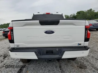 2023 Ford F-150 Lightning Pro z VIN 1FTVW1ELXPWG63466, wystawiony jako Copart lot #59163895 z przebiegiem Nie podano mil oraz Szkody całkowita. Historia ofert i sprzedaży dostępna na DreamBid. Obrazek 6.