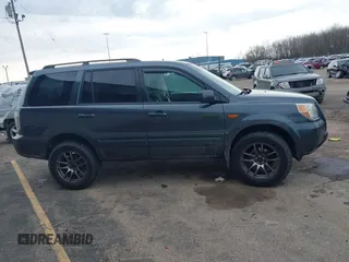 2006 Honda Pilot EX with VIN 5FNYF18426B014815, listed as a IAAI auction lot 42109149 with 284,163 mi miles and . Bid and sale history available at DreamBid. Image 13.