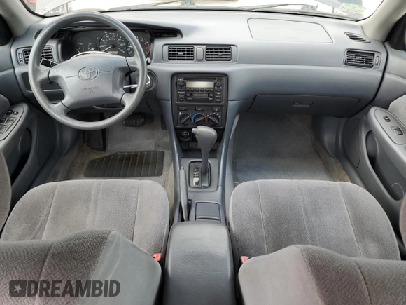 2001 Toyota Camry CE z VIN 4T1BG22K31U795050, wystawiony jako Copart lot #55054025 z przebiegiem 161 228 mil mil oraz Szkoda całkowita • Salvage title. Historia ofert i sprzedaży dostępna na DreamBid. Obrazek 8.
