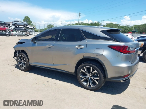 2021 Lexus RX 350 with VIN 2T2HZMAA2MC211568, listed as a IAAI auction lot 42701950 with 49,439 mi miles and . Bid and sale history available at DreamBid. Image 3.