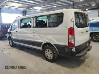2019 Ford Transit Passenger XL with VIN 1FBZX2ZM9KKA06377, listed as a Copart auction lot 43144675 with 105,313 mi miles and Salvage Title. Bid and sale history available at DreamBid. Image 2.